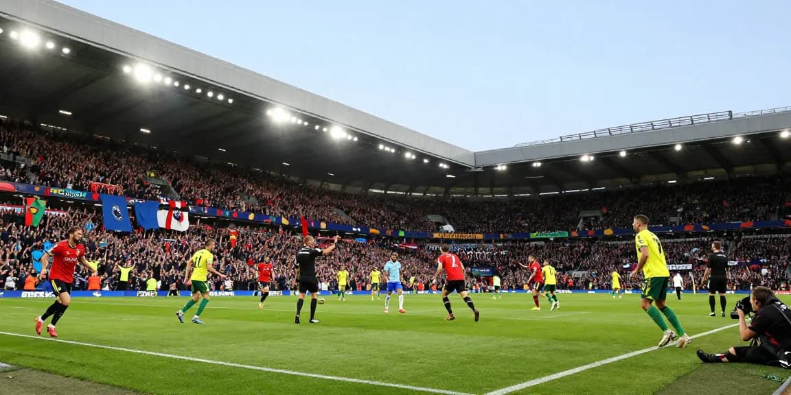 Fans cheering passionately for their team during a BK8 Premier League match.